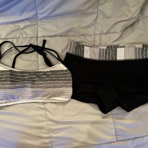 Nike 2 piece black bathing suit. Top is reversible. Size Large